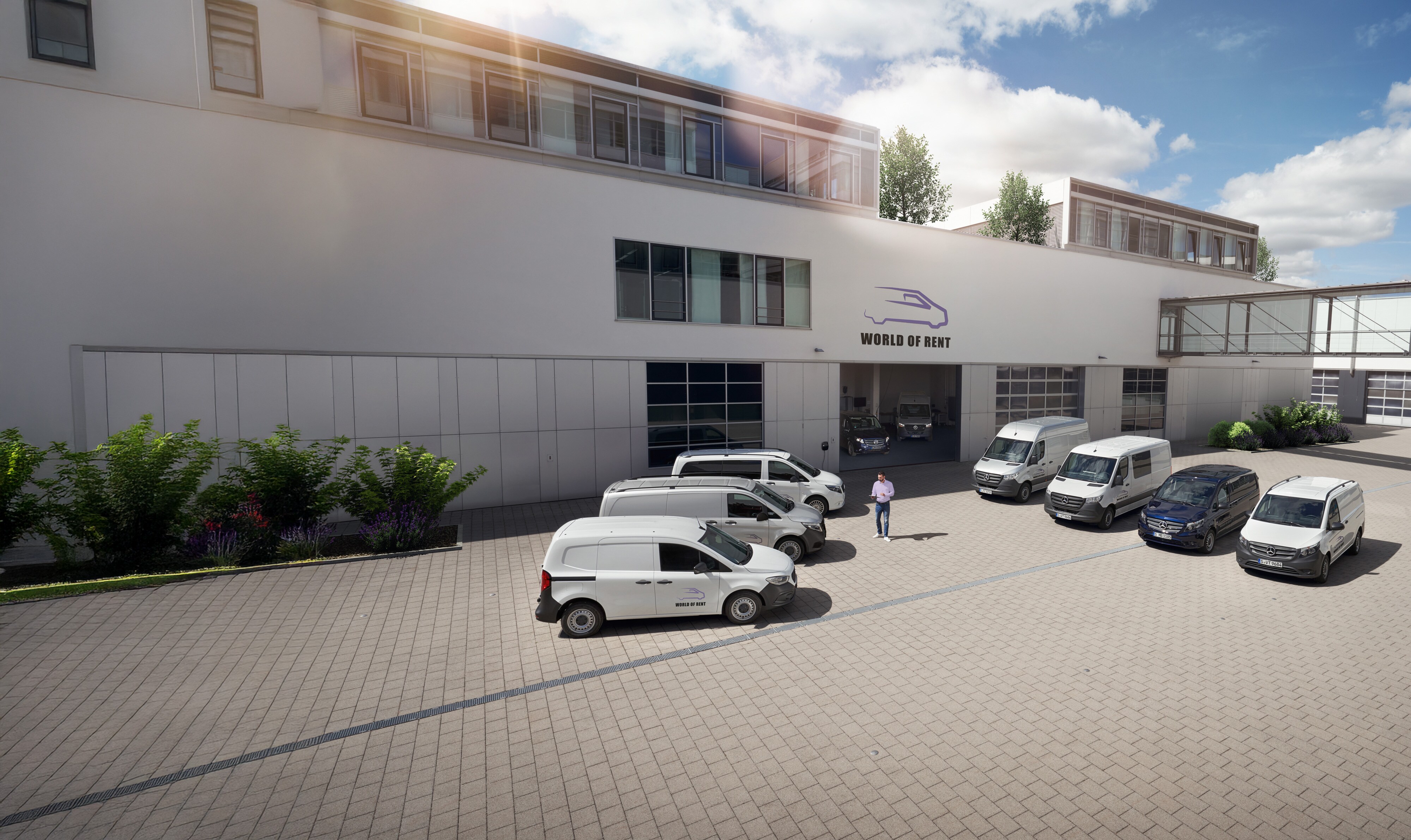 Mercedes-Benz | Servicios - vista general | Servicios para flotas Una flota de furgones Mercedes-Benz delante del edificio de una empresa.